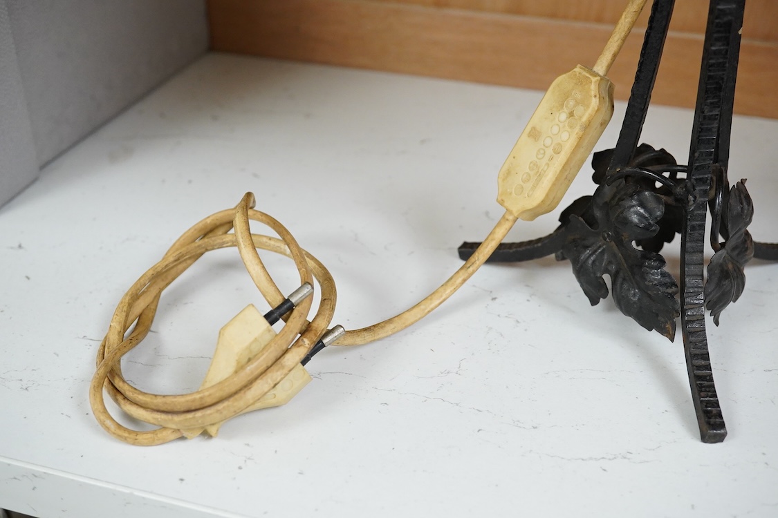 An Art Deco iron lamp with opaline glass shade, 33cm high